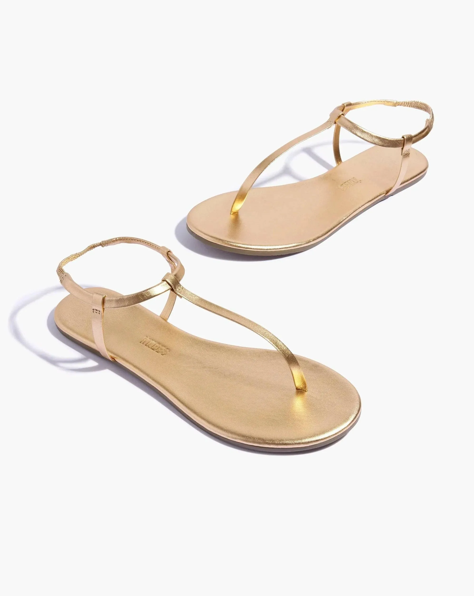 Mariana metallic gold tkees